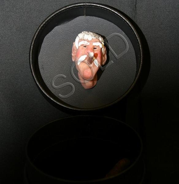 travel humidor.jpg - This little guy is on the inside of a lid to a travel humidor.